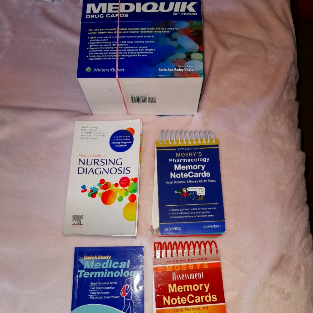 Various nursing textbooks and items